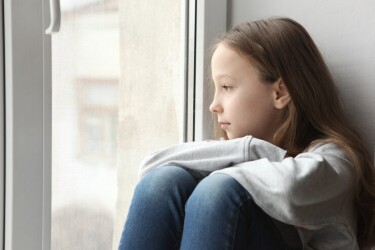 lonely-sad-girl-at-home-saddened-alarmed-child-alone-at-home_441923-6106