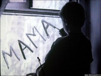 Мальчик у окна